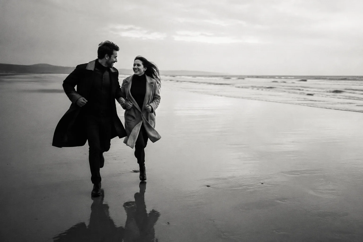 Couple walking together by the sea