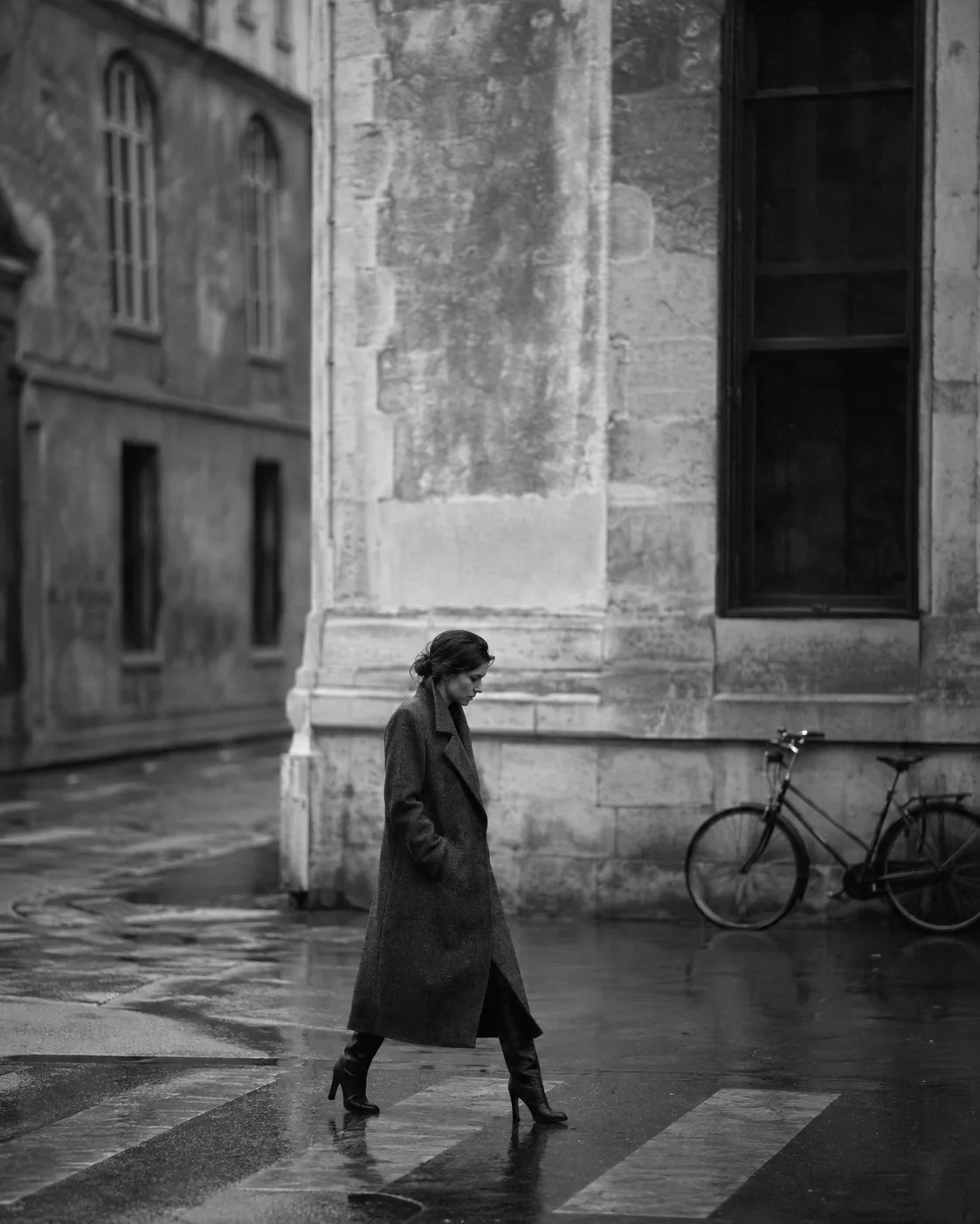 Woman crossing a rain-swept street